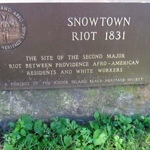Snow Town Riot historical marker located at the Smith Street end of Roger Williams National Memorial